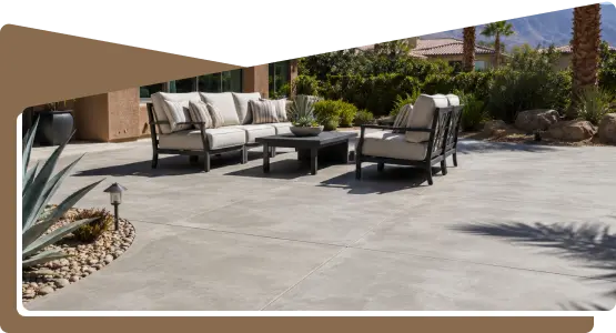 backyard-concrete-patio-with-table-and chairs-ultimate-pro-landscaping-coachella-valley