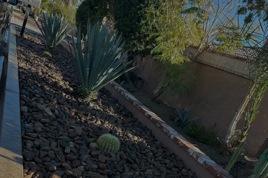 landscaper-backyard-decorative-rock-and-dry-river-bed-installation-28-ultimate-pro-landscaping-coachella-valley 2
